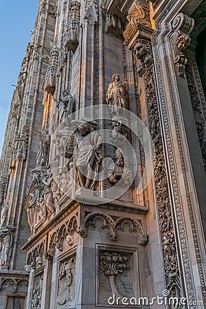 Close up of sculpture that decorating around Duomo di Milano church in the early morning, Milan Italy Stock Photo