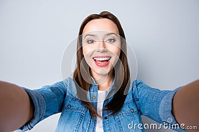 Close up self-portrait of happy brunette pretty girl with beam Stock Photo