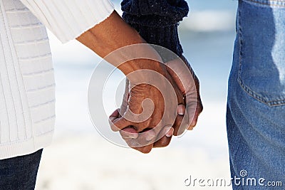 Close Up Of Senior Couple Holding Hands Stock Photo