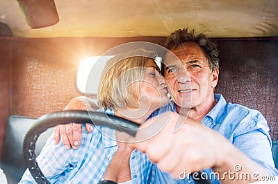 Close up of senior couple inside a pickup truck Stock Photo