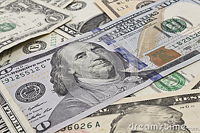 Close up of several dollar bills chaotically aligned Stock Photo