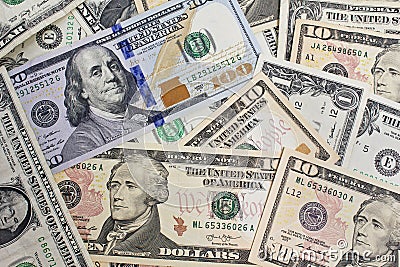 Close up of several dollar bills chaotically aligned Stock Photo