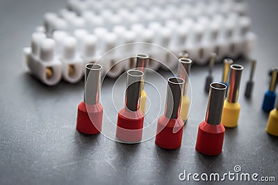 Close up several Wire Ferrule and terminal block w wire on top of a black table Stock Photo