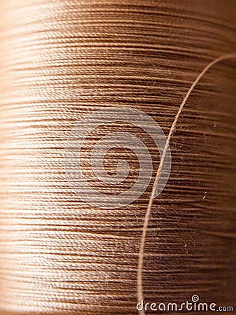 close up of sewing cotton brown home repair macro texture Stock Photo