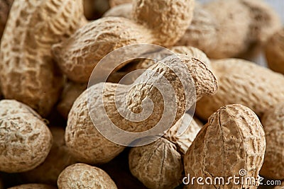 Peanut shells food background, close-up, shallow depth of field, macro. Stock Photo