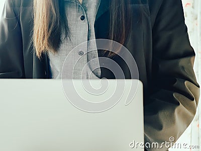 Close up shirt and suit of business woman 30s to 40s in full b Stock Photo