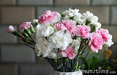 Close up shot of a bouquet of white and pink carnation flowers. Stock Photo