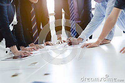 Close up shot business people team meeting in conference room in company. Businessman pointing pen at document on the table Stock Photo