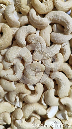 Close up shot of Cashew nuts background. Stock Photo