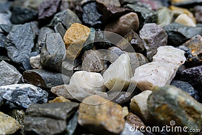 A close up shot of colorful gravel. Gravel is a loose aggregation of rock fragments Stock Photo