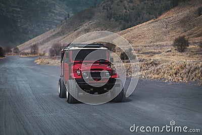 Close up shot of driving red jeep on Bromo road Stock Photo
