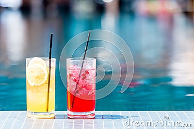 close-up shot of glasses of delicious red and orange cocktails Stock Photo