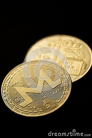 Golden Monero XMR cryptocurrency Editorial Stock Photo