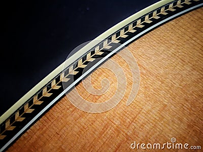 Close up shot of Herringbone Purfling detal on guittar Stock Photo