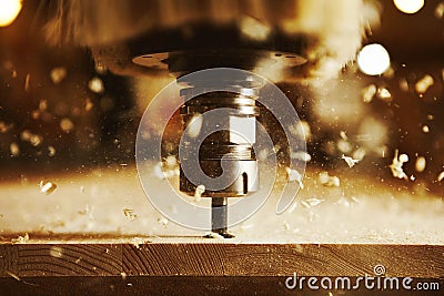 Close-up shot of machine with numerical control cuts wood. Cnc tool. Stock Photo