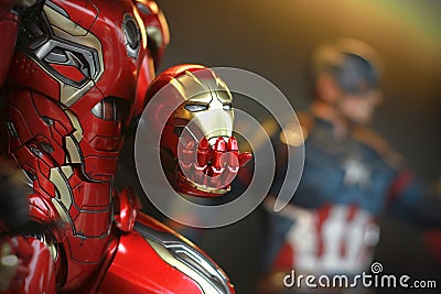 Close up shot Mask In hand of Ironman in AVENGERS superheros figure in action Editorial Stock Photo