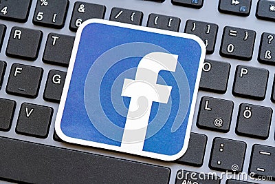 Close-up shot of the Meta Facebook logo symbol on a desktop PC computer keyboard, closeup. Social media, Metaverse, FB and Editorial Stock Photo