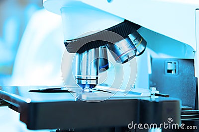 Close up shot of microscope at the blood laboratory Stock Photo