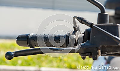 Close up shot of motorcycle brake lever and throttle from top view Stock Photo