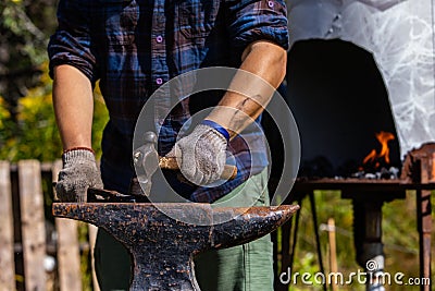 Metalwork artisan at culture festival Stock Photo