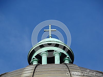 Close-up shot of an ornate roof with a vibrant green hue Stock Photo