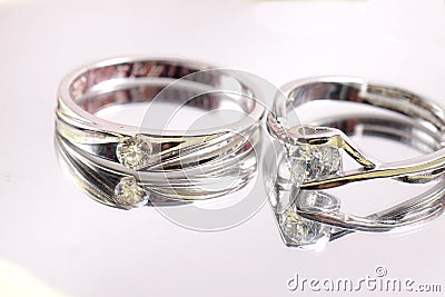 Close up shot of pair engagement / mariage rings isolated Stock Photo