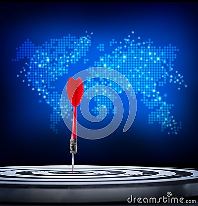 Close up shot red dart arrow on center of dartboard concept for Stock Photo