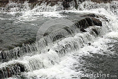 Close up shot of a rushing stream in forest creek. Stock Photo