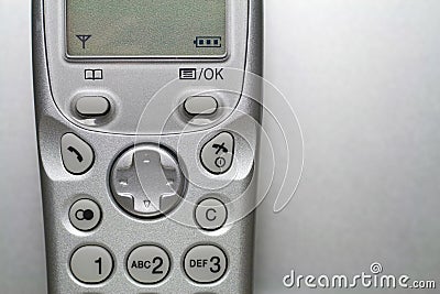 Close up shot of a silver cordless phone Stock Photo