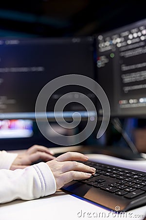 Close up shot of IT specialist writing, testing and debugging code Stock Photo