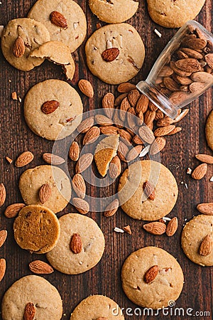 Close-up shot of a stack of freshly baked cookies with almonds. Stock Photo