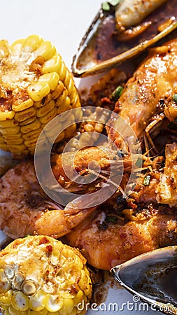 A close-up shot of thaifood corn prawn oyster streetfood vercal Stock Photo