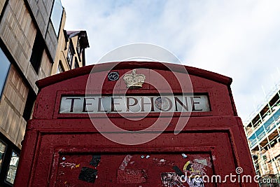 Close up shot of a Typical United Kingdom Red Telephone Booth Editorial Stock Photo