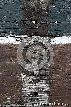 A close-up of the side of an old wooden rowing boat Stock Photo