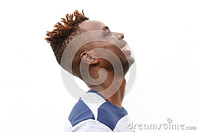 Close up side portrait handsome afro young man laughing against white background Stock Photo