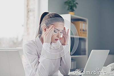 Close up side profile photo beautiful she her business lady suffering terrible head ache hold hands arms forehead Stock Photo