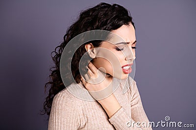Close up side profile photo beautiful she her lady suffering strong terrible neck ache hold hand arm fingers hurt zone Stock Photo