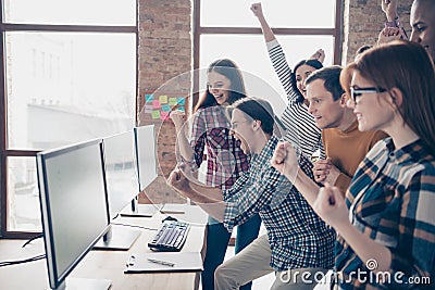 Close up side profile photo business many people partnership meeting team building arms hands fists raised up first Stock Photo