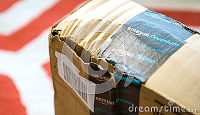 Close-up side view of damaged Amazon Prime cardboard Editorial Stock Photo