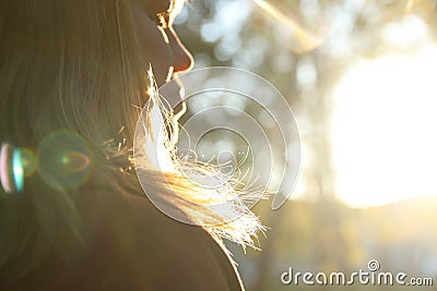 Close-up silhouette of woman looking at sunrise. Mental health, hope, happiness concept. Dream autumn. Peace lifestyle. Open mind Stock Photo