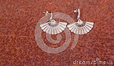 Close up of silver earrings Stock Photo