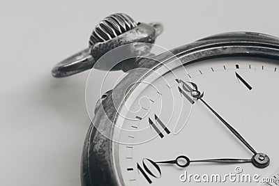 Close Up silver old pocket watch. Vintage timepiece. Antique concept. Stock Photo