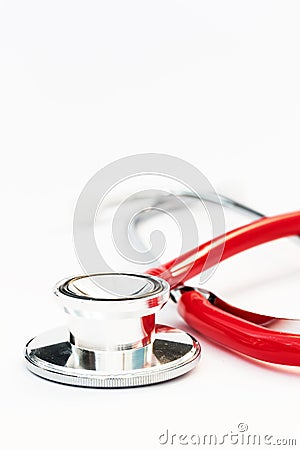 Close up of a silver stethescope with red tubing Stock Photo