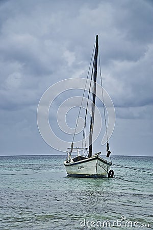 Close up of Single motor boat on a Caribbean beach Editorial Stock Photo