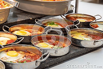 Close up of single servings of shakshuka a traditional Israeli egg dish with tomato Stock Photo