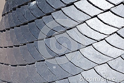 Close up of slate roof tiles background. Stock Photo