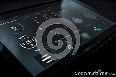 close-up of sleek touchscreen panel, with icons and settings for music, lighting, and temperature Stock Photo