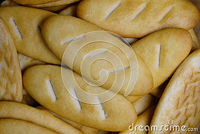 Close-up of small cookies, top view, macro, loaf-shaped Stock Photo