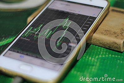Close-up of smartphone placed on table. Stock Photo