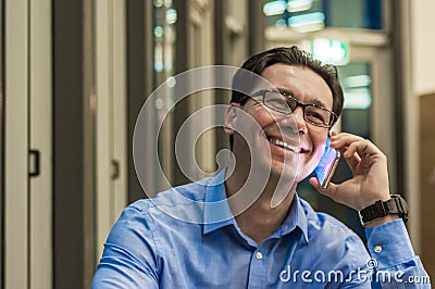 Close up of smiling businessman using modern smart phone, Stock Photo